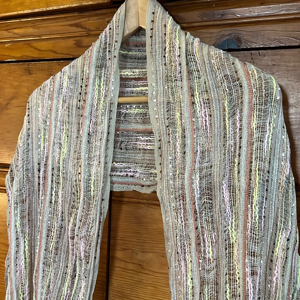 Long neutral scarf.